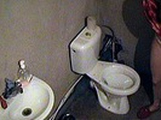 Complying night ritual of sexy blonde in red nighty and slippers caught on spy camera situated in be passed on toilet. The babe sat on be passed on potty and smoked a drudge having no idea she was obtrusively filmed!